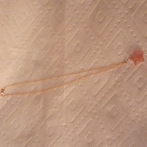 Pink star pendant on rose chain
